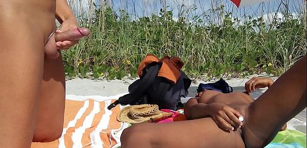  Public beach jerk off. Big cumshot on Aisanippie. Voyeurstyle.